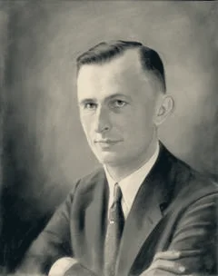 Portrait of S. G. Gaido, the restaurant's founder, in a suit.